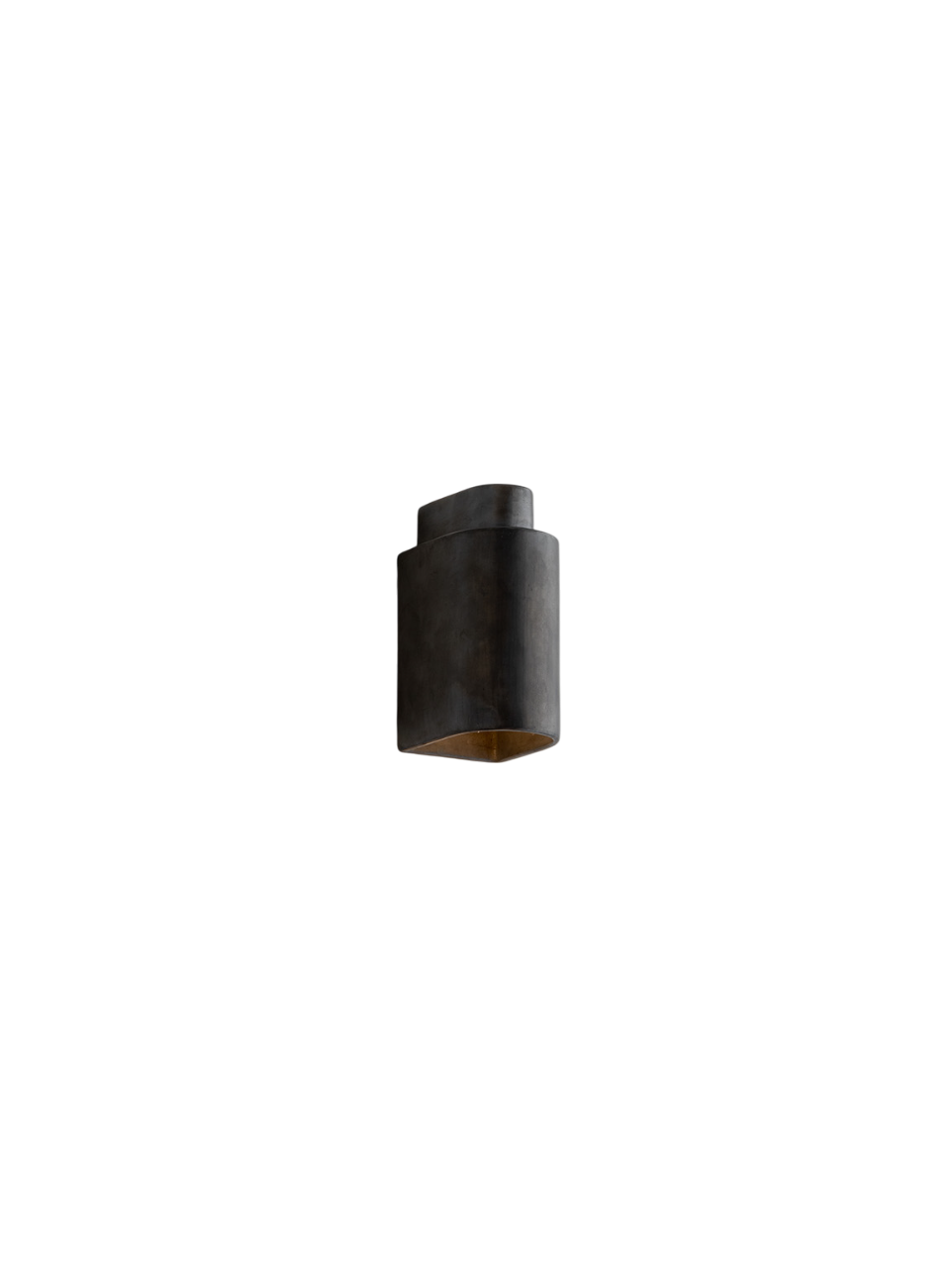 Black cylindrical light fixture on a white background