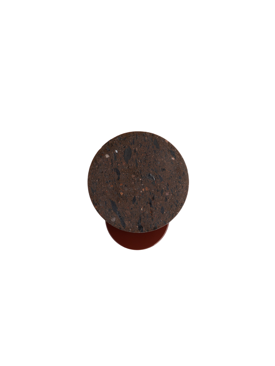 A light fixture with a textured, dark terrazzo stone shade mounted on a red circular metal base.