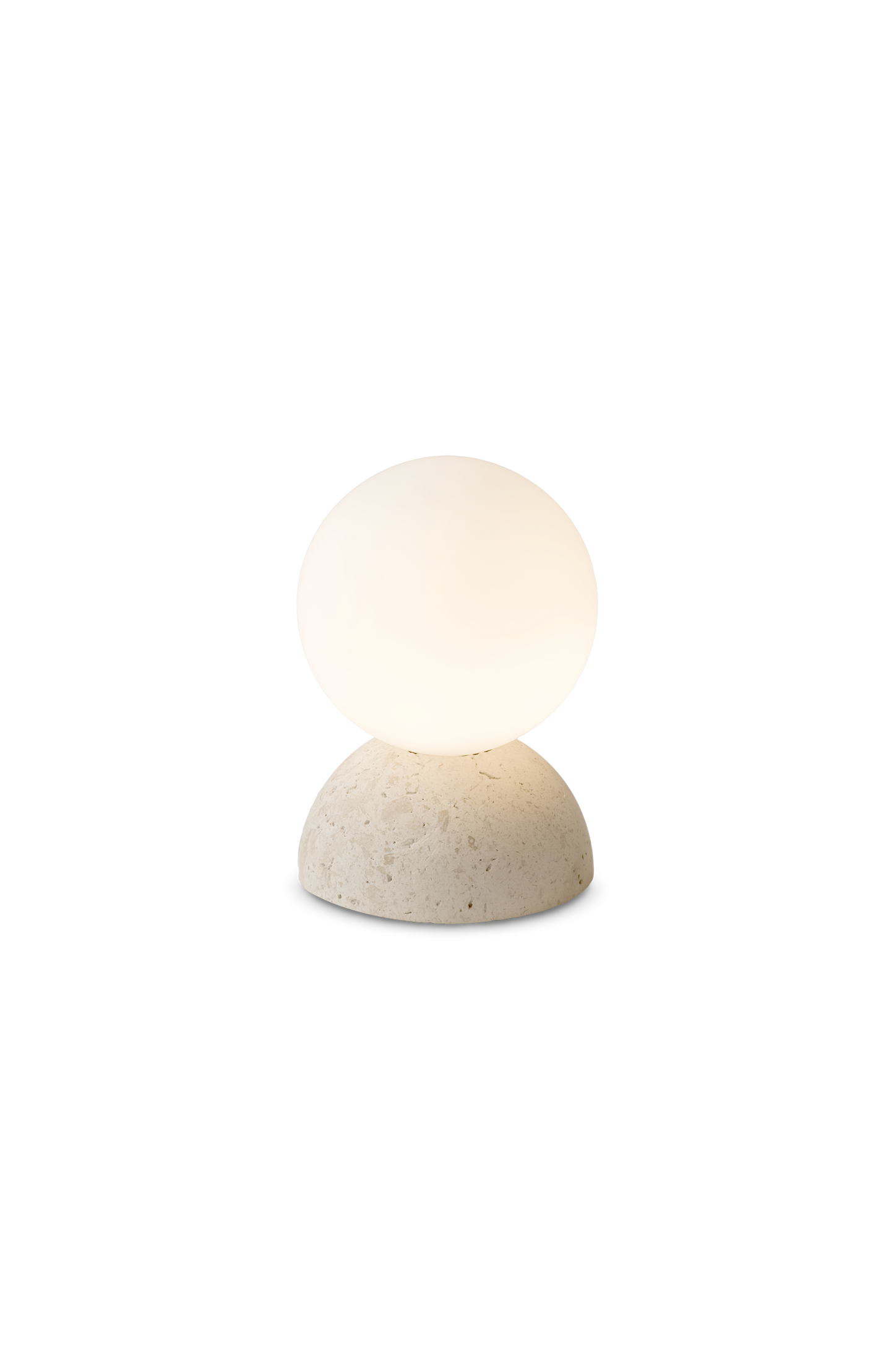 Minimalist table lamp with white stone base and frosted glass globe.