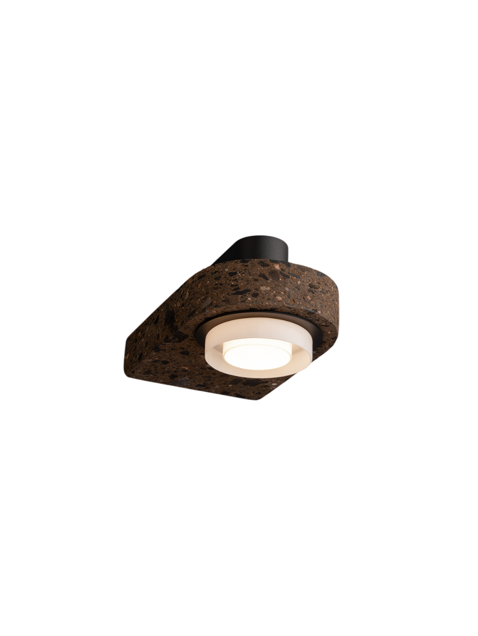 Close-up of a black pendant light with a textured concrete base and a round LED bulb.