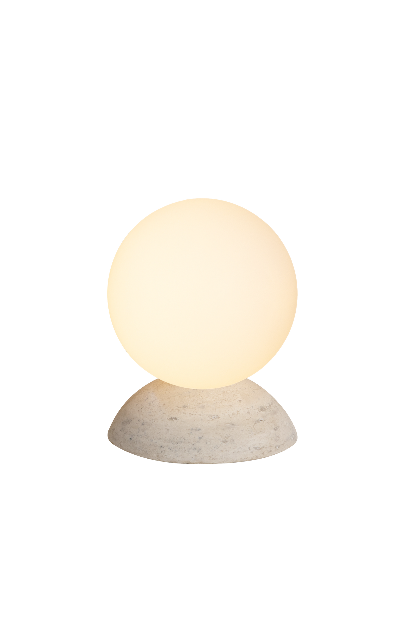 Big table lamp with a round glass shade and stone base on a white background