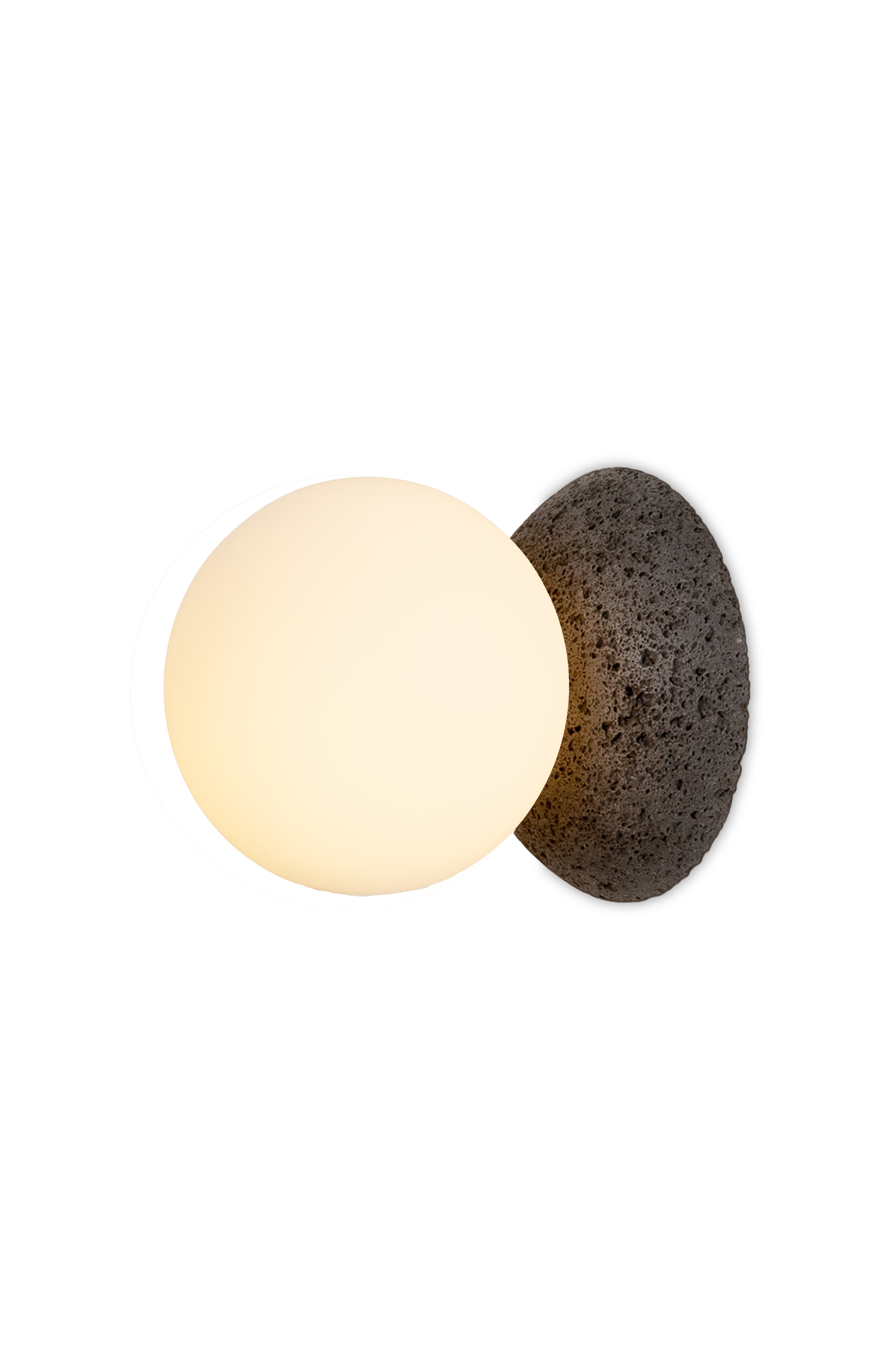 A single glowing wall lamp with a volcanic stone base.