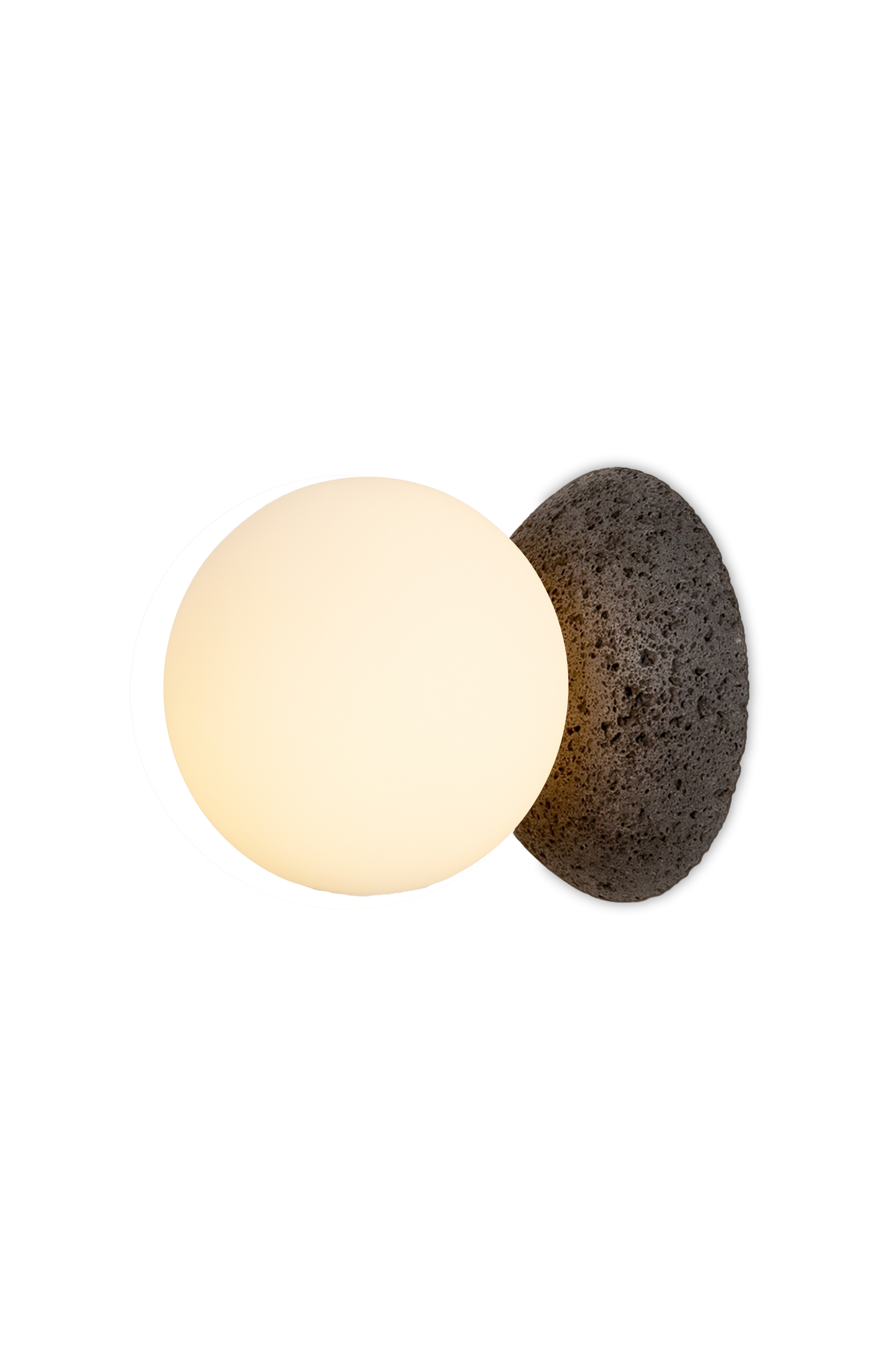 A single glowing wall lamp with a volcanic stone base.