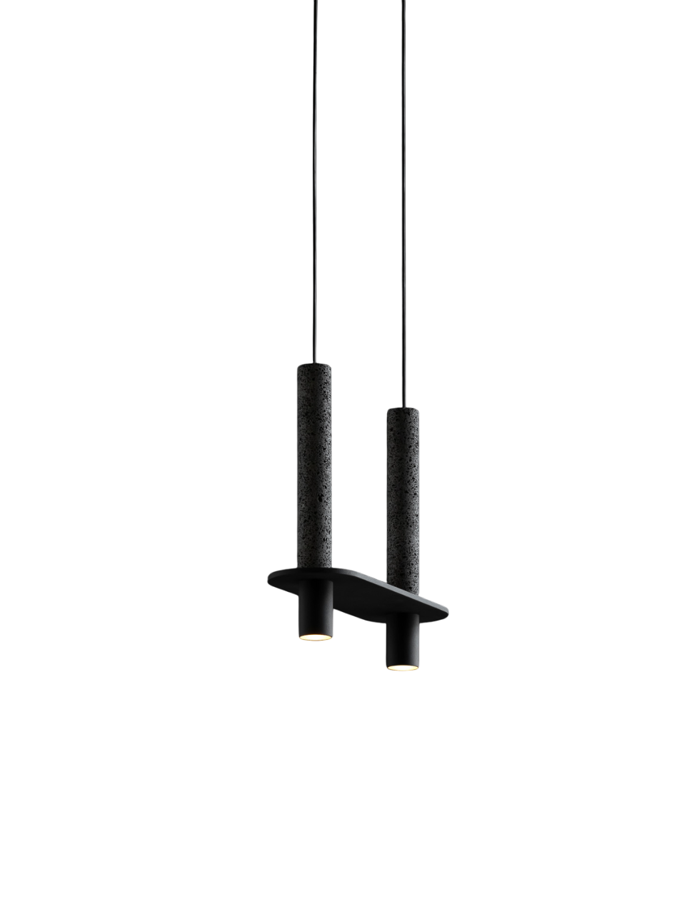 Pendant light with dual stone-like black cylindrical supports, featuring two small downlights beneath a shared base.