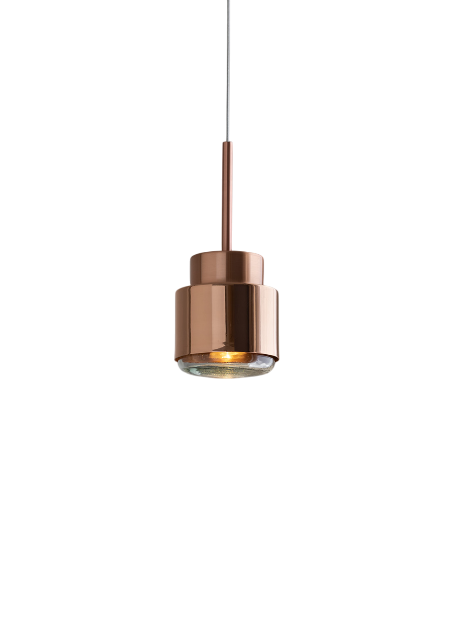 A photo studio of a pendant lamp with polished copper finish.