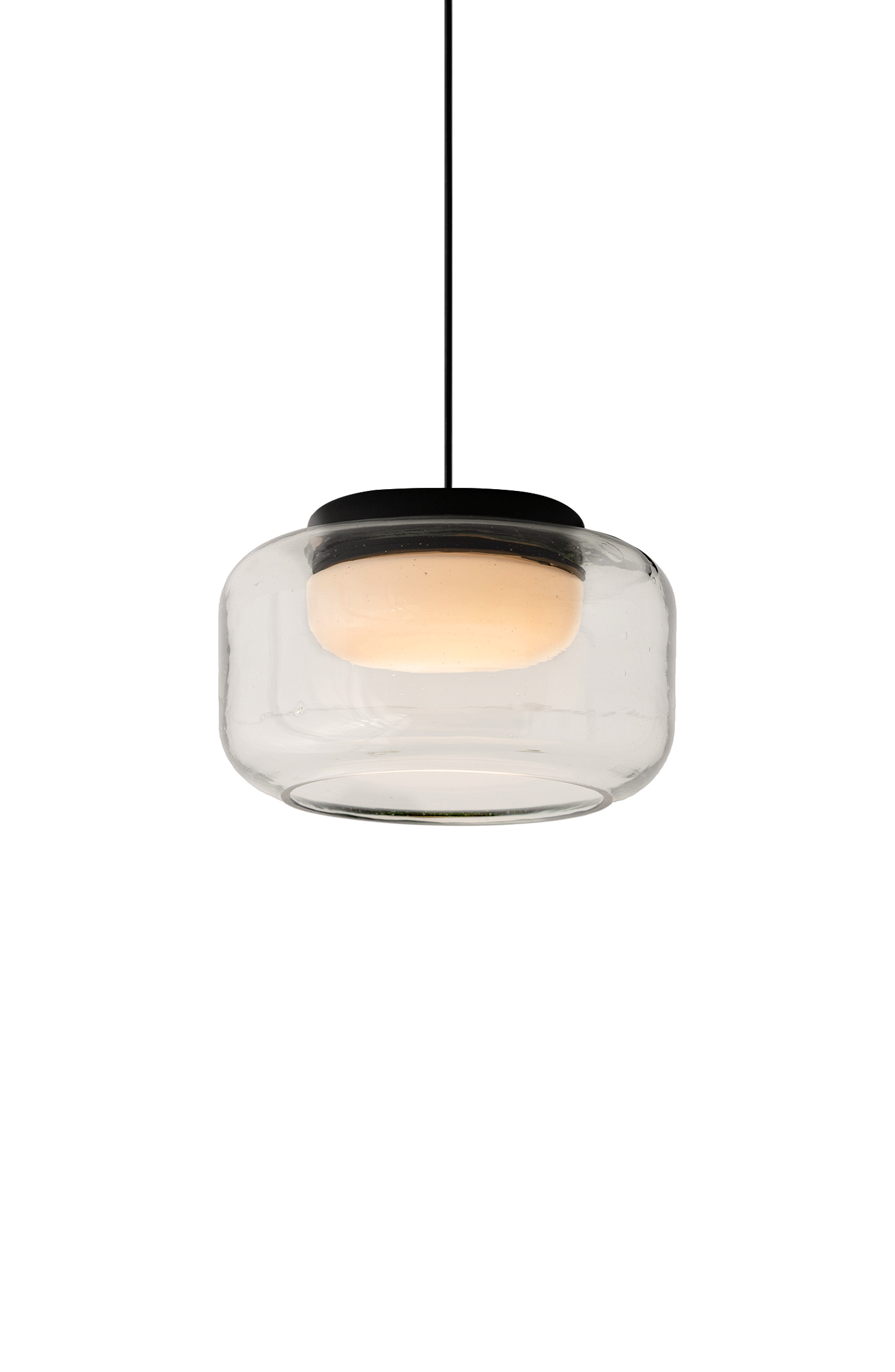 Clear glass pendant light with a black top, glowing softly at the center.
