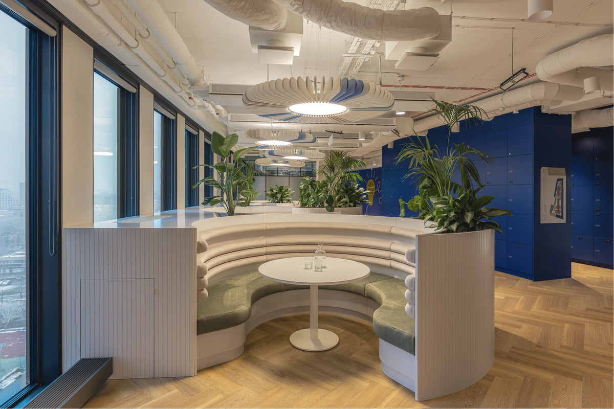 Flexxica Sol acoustic pendant light above an office space