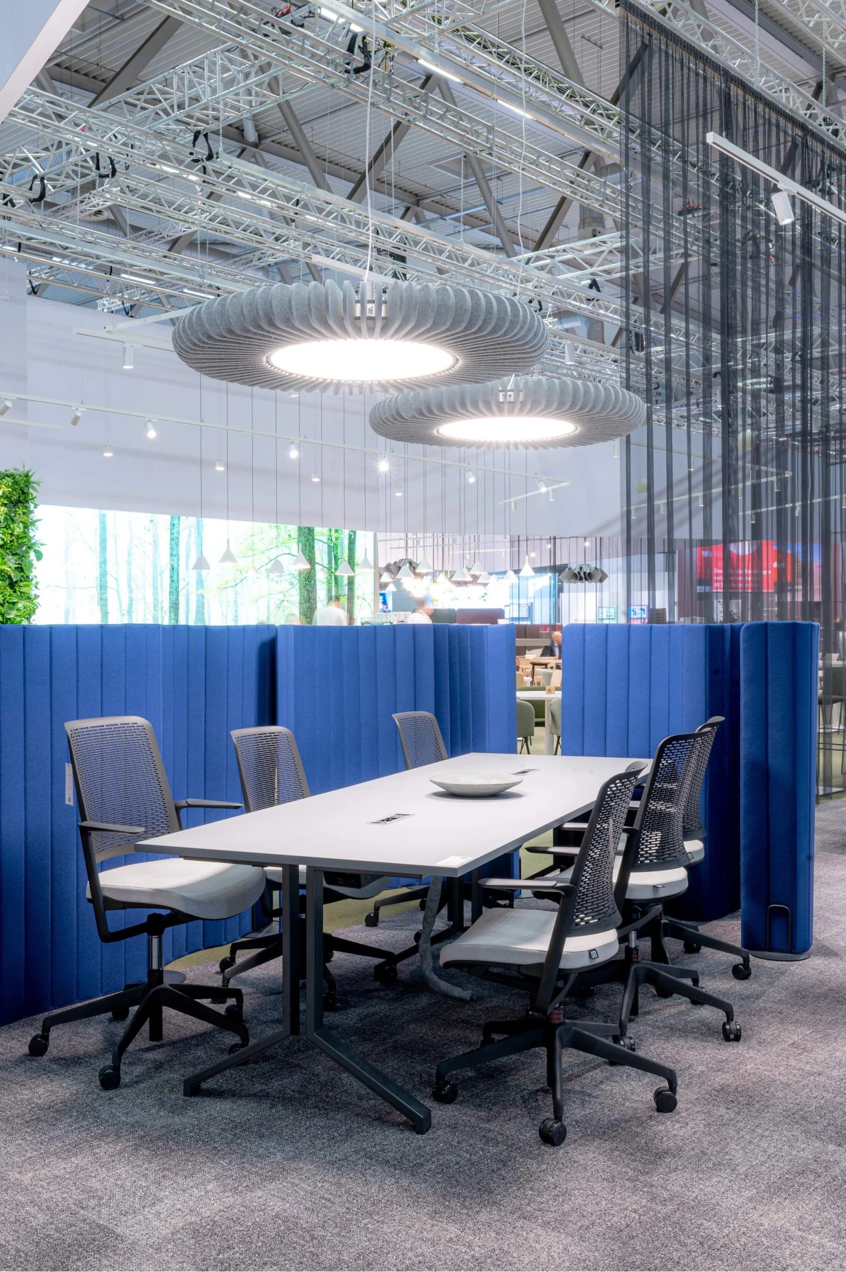 Flexxica Sol acoustic pendant light with Nowy Styl furniture