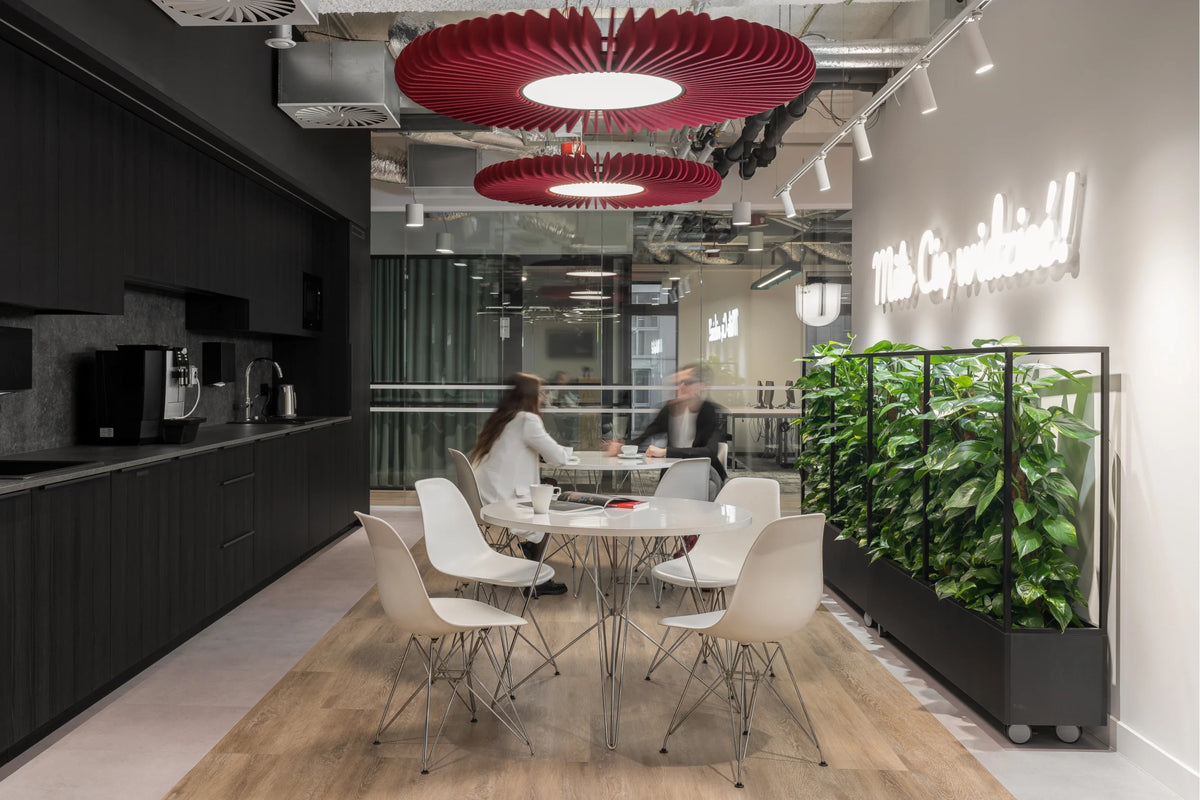 Flexxica Sol acoustic pendant lights in an office by Trzop Architekci