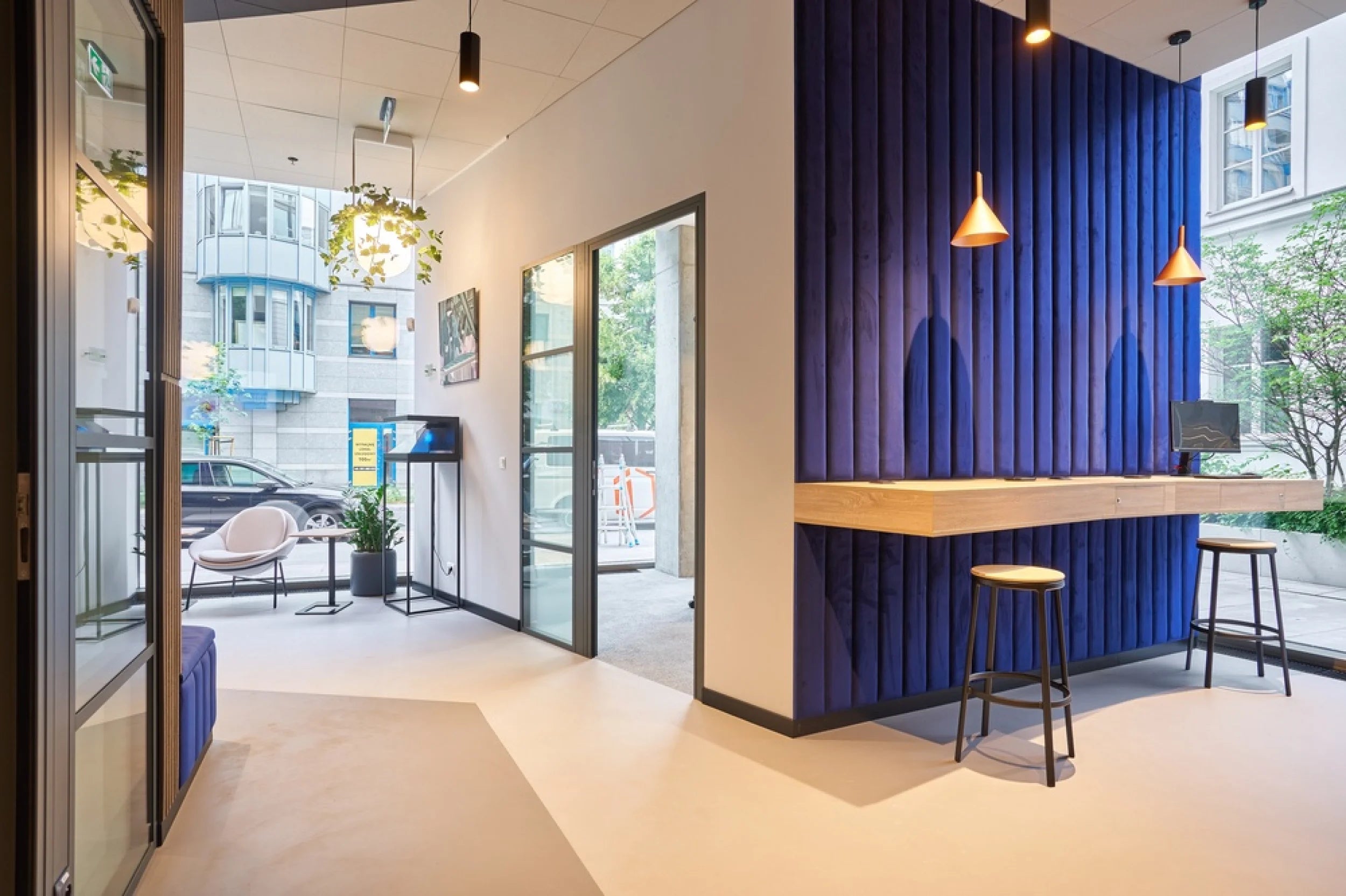 Flexxica Jungle pendant lights above a breakout area